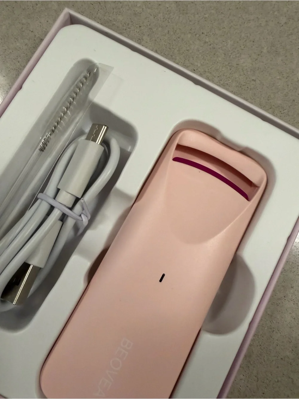 Heated eyelash curler